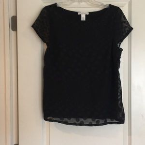 Decorative, formal black top. Short sleeves